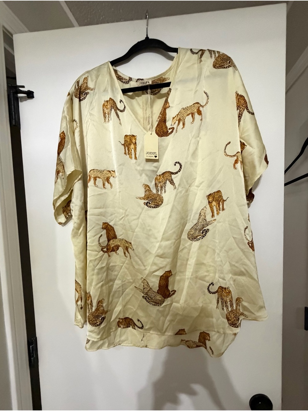 JODIFL Cream Animal Print V-Neck Blouse